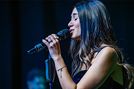 Jazz vocalist performing on stage